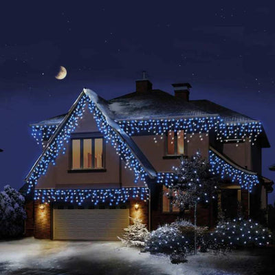 Christmas Icicle Lights outdoors on house in blue and white