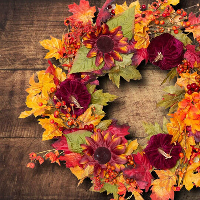 Autumn Wreath with Pumpkins and Autumn Foliage and berries