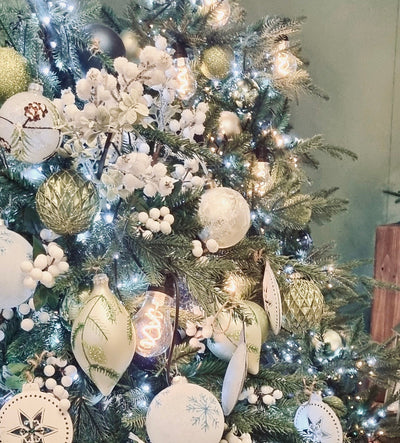 White and Green Christmas Baubles on Tree