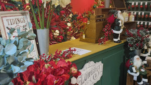 Christmas Floristry Boutique with Santa Claus decorations, stems, picks and vintage case register