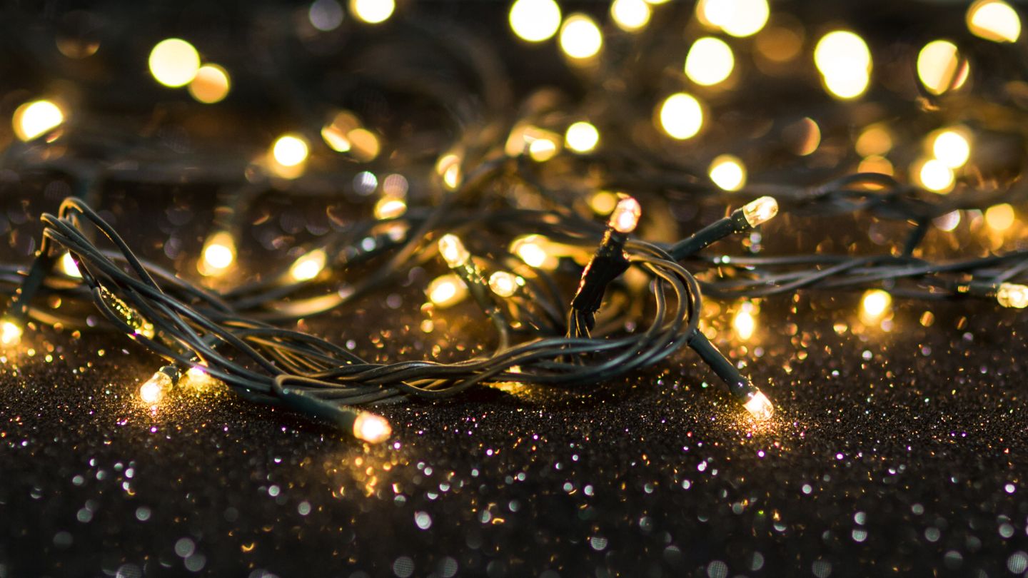 LED Warm White String Lights for Christmas on glitter background