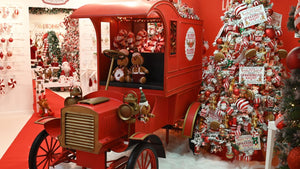 Red Christmas Vintage Car with Gingerbread Men, with candy cane Christmas tree with decorations