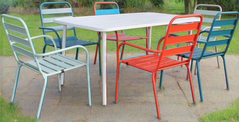 colourful outdoor table and chairs for a party