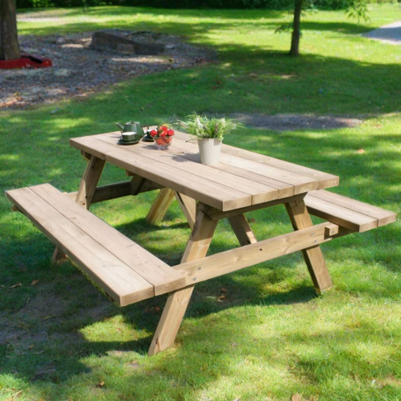 wooden picnic table in garden