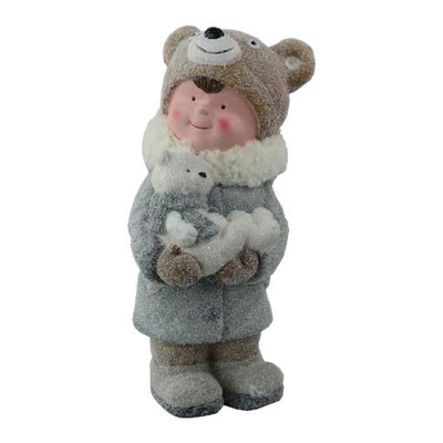 Christmas Figure Little Boy holding a cuddly Teddy Bear with powdered snow