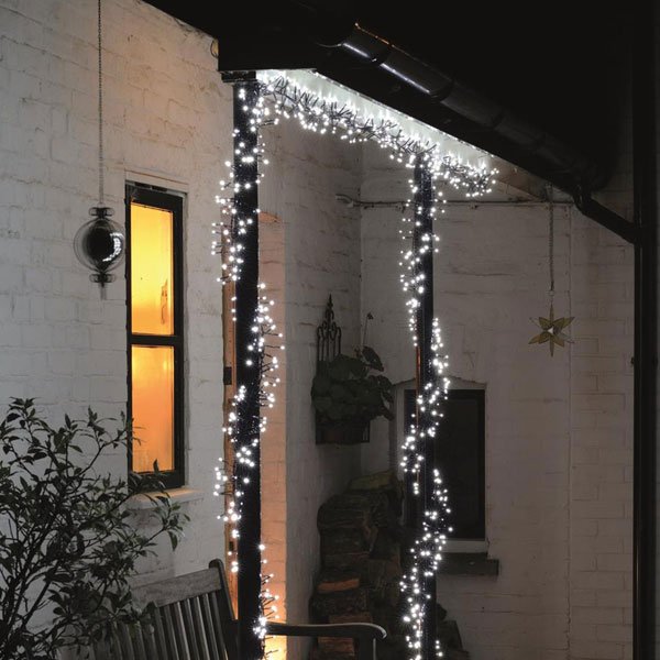 Cool white Christmas Cluster Lights on Doorway