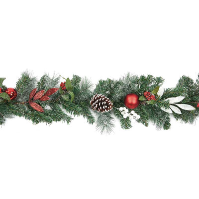 Christmas Garland decorated with pine cones, baubles and berries