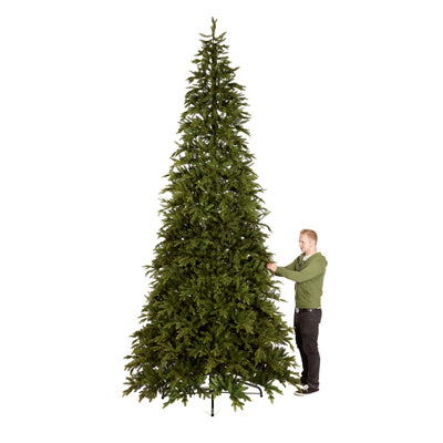Man Fixing 13 ft Artificial Christmas Tree