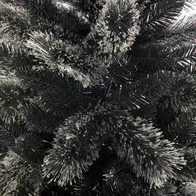 Detail of black artificial Christmas tree with frosted tips