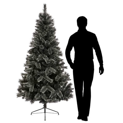 Silhouette of man beside black frosted tips artificial Christmas Tree