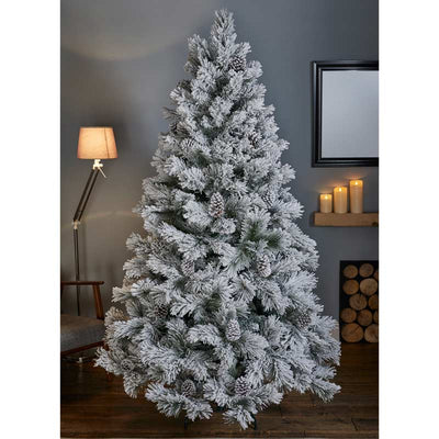 Snowy White Christmas Tree with Pine cones